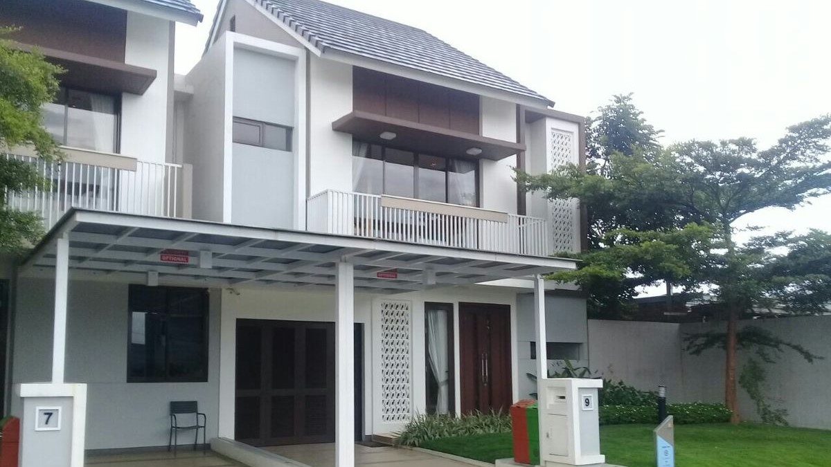 Hasil akhir renovasi rumah minimalis dengan pencahayaan alami dan desain interior bersih.